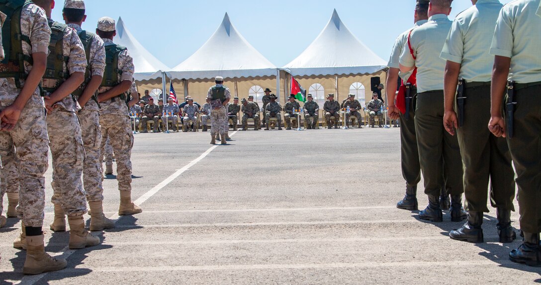 New Jersey National Guard Soldiers, with 1st Squadron, 102nd Calvary Regiment, and Jordan Border Guard Force Soldiers, with the 7th Mechanized Battalion, 48th Mechanized Brigade, participate in the Jordan Operational Engagement Program (JOEP) opening ceremony July 14, 2019. JOEP is a 14-week individual and collective training, as well as a military partnership between Jordan and America.