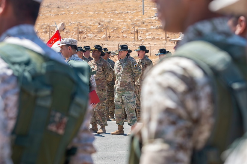 New Jersey National Guard Soldiers, with 1st Squadron, 102nd Calvary Regiment, and Jordan Border Guard Force Soldiers, with the 7th Mechanized Battalion, 48th Mechanized Brigade, participate in the Jordan Operational Engagement Program (JOEP) opening ceremony July 14, 2019. JOEP is a 14-week individual and collective training, as well as a military partnership between Jordan and America.
