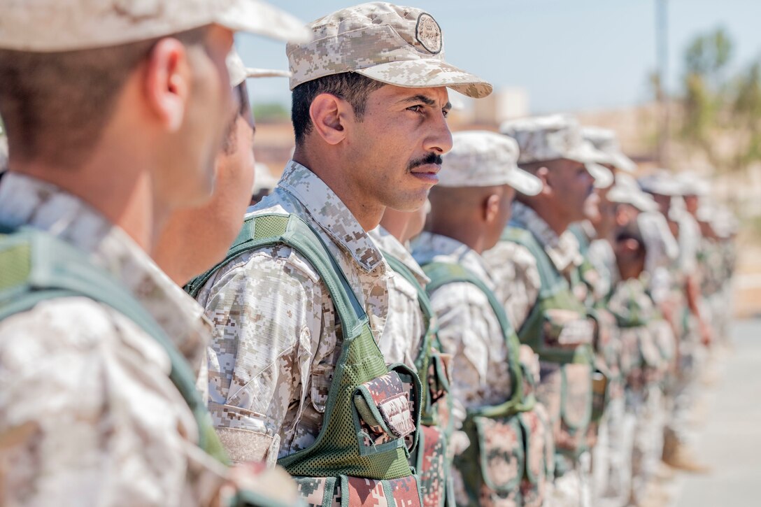 New Jersey National Guard Soldiers, with 1st Squadron, 102nd Calvary Regiment, and Jordan Border Guard Force Soldiers, with the 7th Mechanized Battalion, 48th Mechanized Brigade, participate in the Jordan Operational Engagement Program (JOEP) opening ceremony July 14, 2019. JOEP is a 14-week individual and collective training, as well as a military partnership between Jordan and America.
