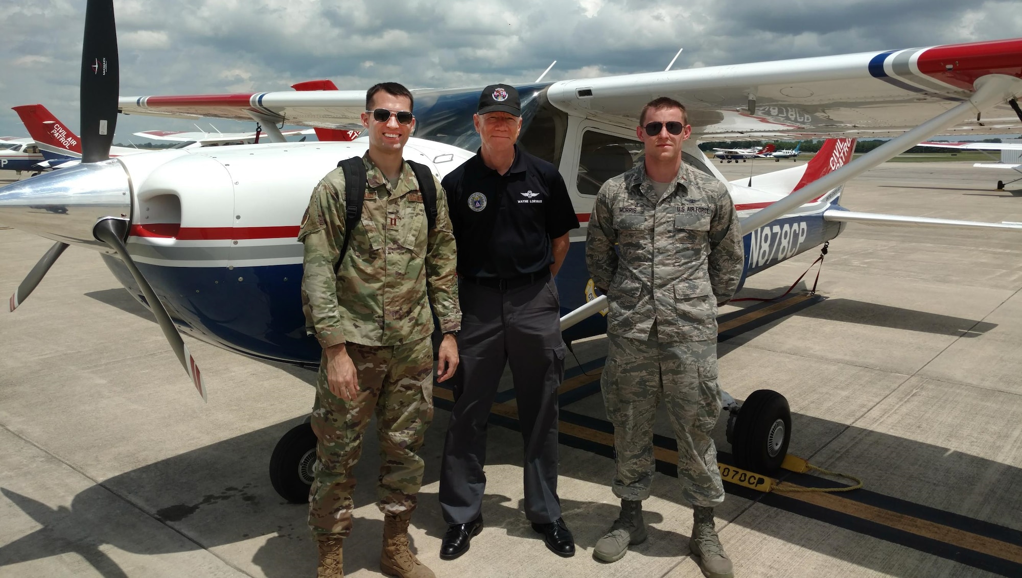 Lt. Col. Wayne Lorgus (center) of the Arizona Wing poses for a photo with Capt. Jared Strickland (left), assigned to Luke Air Force Base, Ariz., and 2nd Lt. Tyler Morris, assigned to Buckley AFB, Colo. (Civil Air Patrol photo by Ron Olienyk)