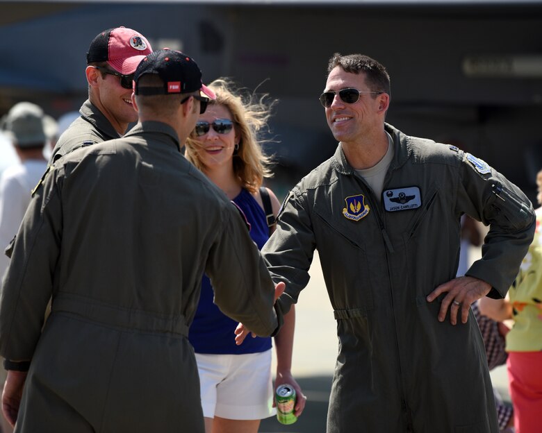 Col. Jason A. Camilletti, 48th Fighter Wing Operations Group commander, greets his Airmen at Royal Air Force Marham’s annual Friends and Family Day July 25, 2019. RAF Marham extended its tickets to 100 Liberty Wing Airmen to attend the show and enjoy its festivities building on the strong relationship between the RAF and the U.S. Air Force. (U.S. Air Force photo by Airman 1st Class Madeline Herzog)
