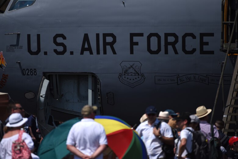 Showgoers wait in line to board a KC-135 Stratotanker at Royal Air Force Marham’s annual Friends and Families Day July 25, 2019. The event also had other attractions such as flying displays consisting of the Typhoon FGR4, Rhin DR 107, Rolls Royce Spitfire and Strikemaster; a formula class car demonstration; and U.K.’s premiere military parachute show, The Falcons. (U.S. Air Force photo by Airman 1st Class Madeline Herzog)