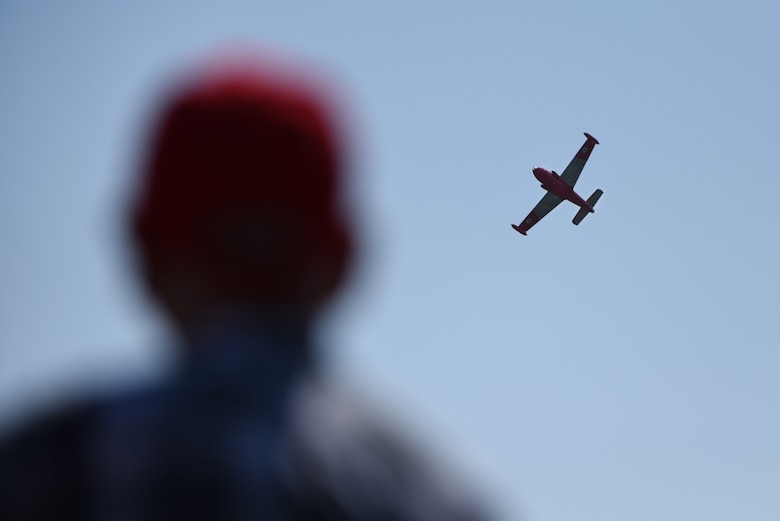 A Strikemaster aircraft puts on a demonstration at Royal Air Force Marham Friends and Families Day July 25, 2019. RAF Marham extended its tickets to 100 Liberty Wing Airmen to attend the show and enjoy its festivities building on the strong relationship between the RAF and the U.S. Air Force. (U.S. Air Force photo by Airman 1st Class Madeline Herzog)
