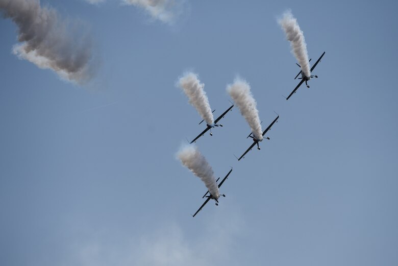 The air demonstrations team, the Globalstars, perform maneuvers during Royal Air Force Marham’s annual Friends and Families Day July 25, 2019.  The event is about recognizing the dedication of those working at RAF Marham and the support of their family and friends. (U.S. Air Force photo by Airman 1st Class Madeline Herzog)