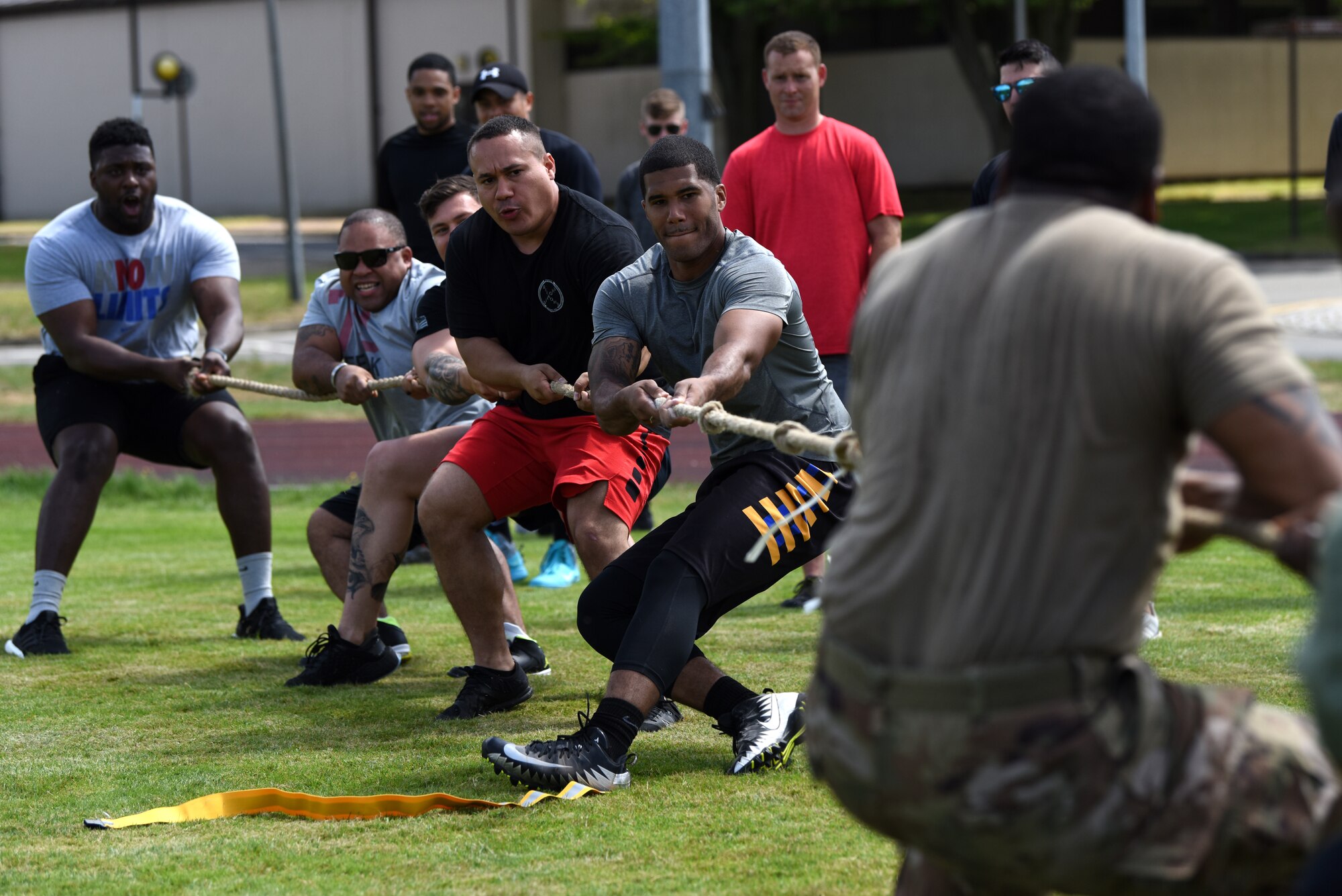 U.S. Airmen assigned to the 48th Mission Support Group participate in tug of war during the annual 48th MSG Olympics at Royal Air Force Lakenheath, England, July 22, 2019. Each 48th MSG squadron formed teams to participate in the games and events throughout the day building resilience through cooperation. (U.S. Air Force photo by Airman 1st Class Madeline Herzog)