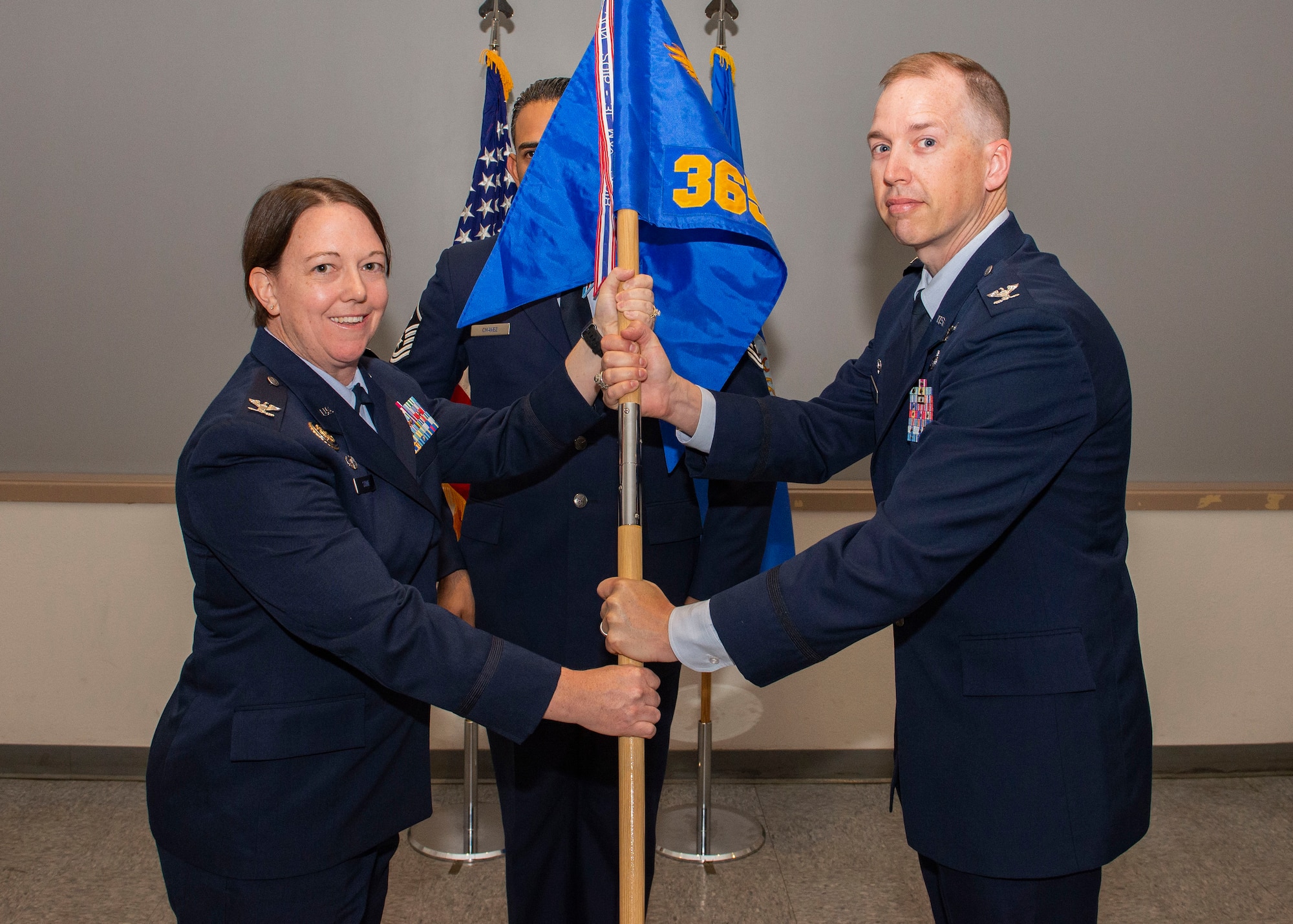 U.S. Air Force Col. Melissa Stone, commander 363d Intelligence, Surveillance and Reconnaissance Wing, transfers command of the 365th ISR Group to U.S. Air Force Col. Jason Arnold.