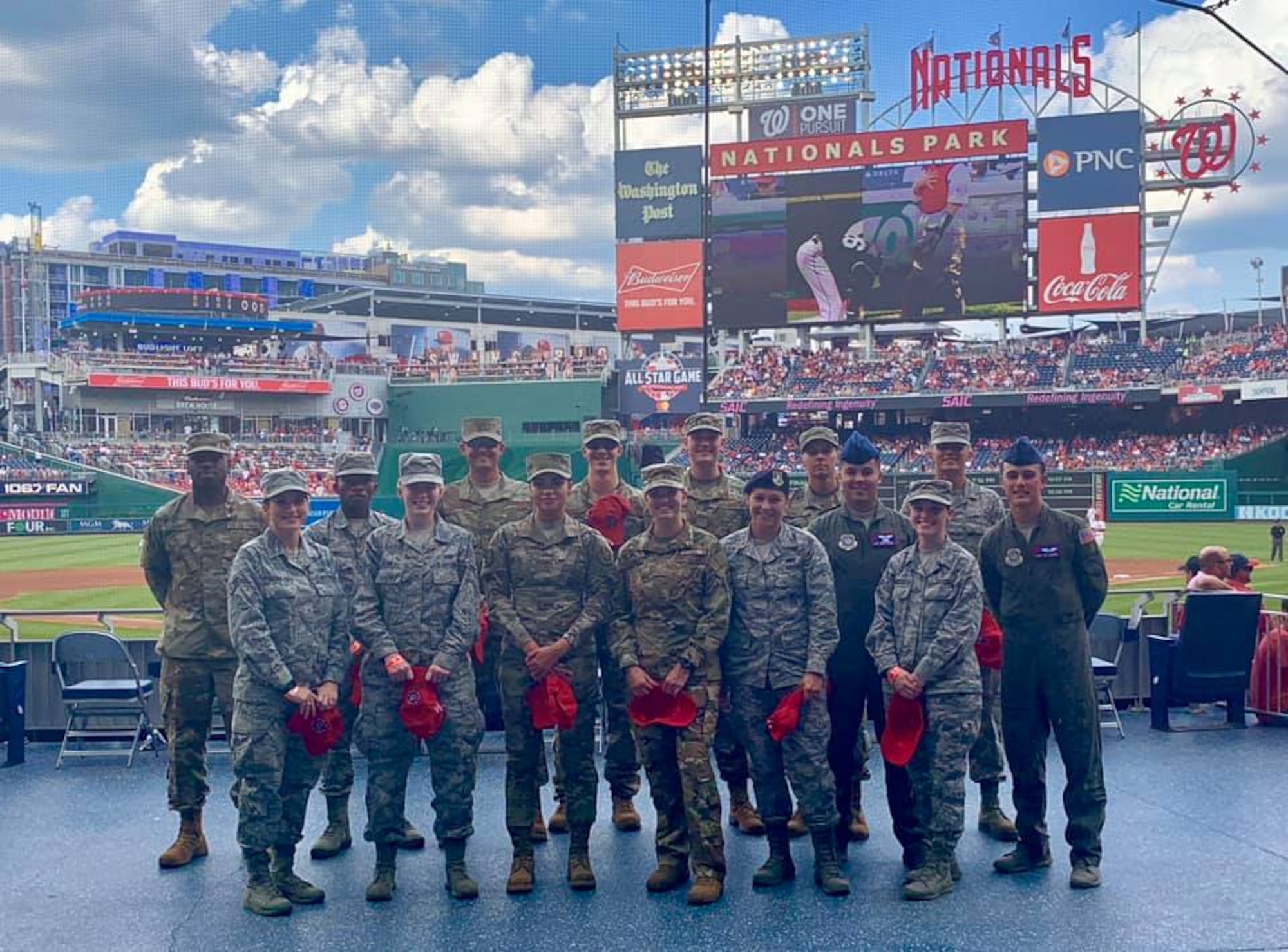 Air Force District of Washington Airmen pose for a photo in front of the Delta Sky360 Club as part of the Salute to Service event July 25. The Washington Nationals offer year-round experiences as thanks and quality-of-life outreach for service members and their families in the Washington region. Around the third inning, honorees are recognized on the NatsHD scoreboard and receive a standing ovation from fans. The Colorado Rockies defeated the Nats 8-7. The next Salute to Service event takes place Aug. 13 against the Cincinnati Reds.