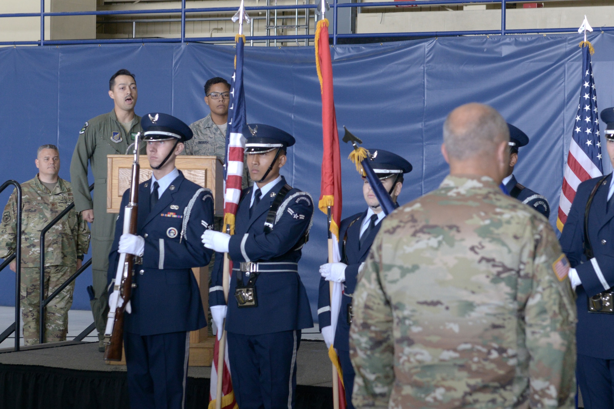 U.S. Air Force Staff Sgt. Sean Todd, 962nd Airborne Air Control Squadron E-3 Sentry instructor computer display maintenance technician, sings the national anthem during the opening ceremony for the 3rd Wing’s 100th anniversary celebration on Joint Base Elmendorf-Richardson, Alaska, July 25, 2019.