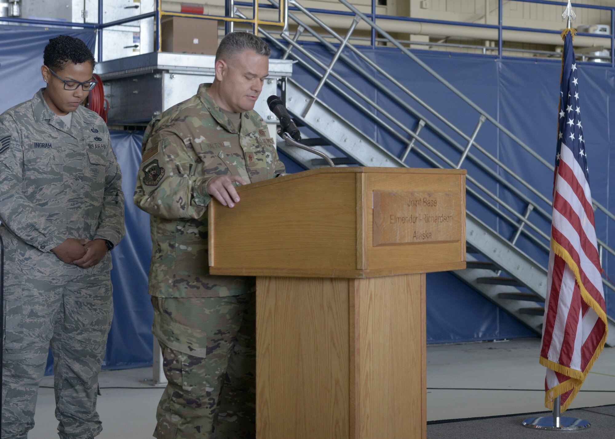 U.S. Air Force Maj. Dave Halton, 3rd Wing chaplain, gives the invocation during the opening ceremony for the 3rd Wing’s 100th anniversary celebration on Joint Base Elmendorf-Richardson, Alaska, July 25, 2019.