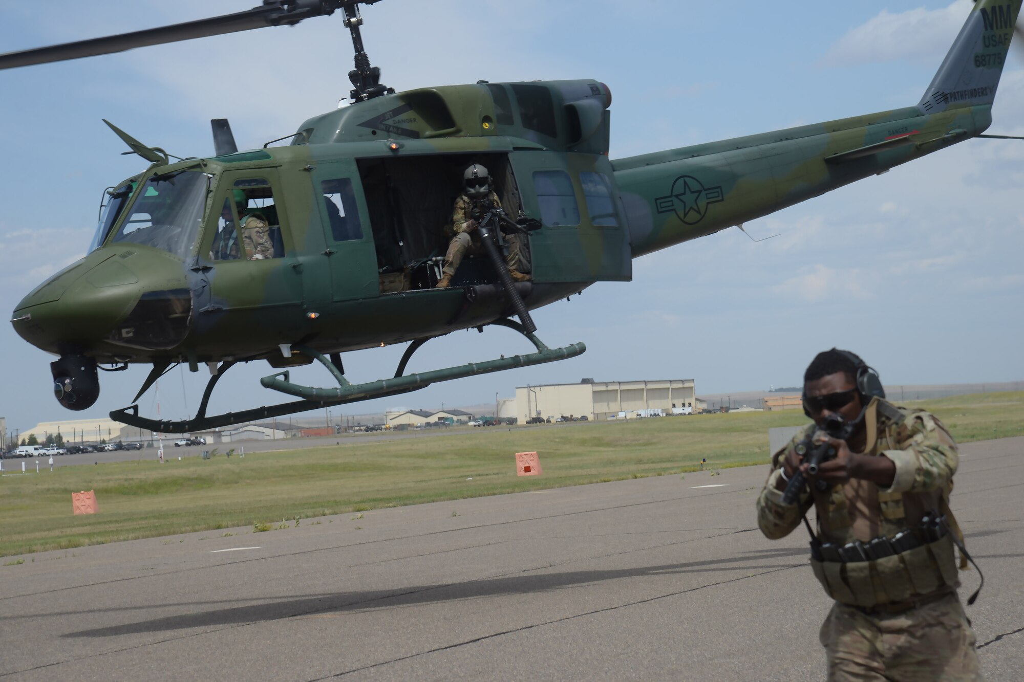 Members from the 341st Security Support Squadron tactical response force surround a vehicle during training with the 40th Helicopter Squadron for the annual Global Strike Challenge July 24, 2019, at Malmstrom Air Force Base, Mont.