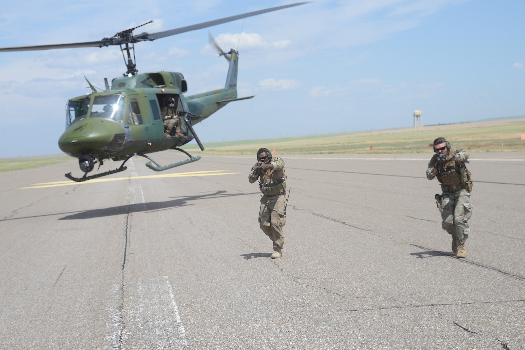 Members from the 341st Security Support Squadron tactical response force surround a vehicle during training with the 40th Helicopter Squadron for the annual Global Strike Challenge July 24, 2019, at Malmstrom Air Force Base, Mont.