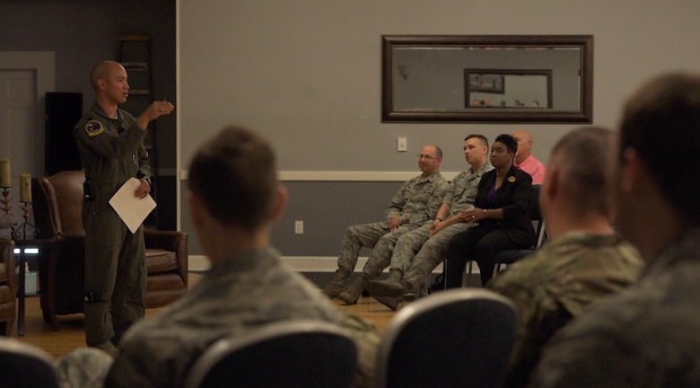 Lt. Col. Earl Arnold, 14th Operations Support Squadron director of operations tells his story at a Storytellers event July 18, 2019, on Columbus Air Force Base, Mississippi. Storytellers originated out of Incirlik Air Base, Turkey, and has grown to become an event held at many Air Force bases all over the world. (U.S. Air Force photo by Senior Airman Keith Holcomb)