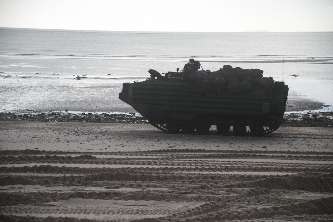 An Assault Amphibious Vehicle with Battalion Landing Team, 2nd Battalion, 1st Marines, 31st Marine Expeditionary Unit, patrols the coast after a simulated raid on Townshend Island, Queensland Australia, July 1, 2019. The 31st MEU, the Marine Corps’ only continuously forward-deployed MEU, provides a flexible and lethal force ready to perform a wide range of military operations as the premier crisis response force in the Indo-Pacific region. (U.S. Marine Corps photo by Lance Cpl. Kyle P. Bunyi)