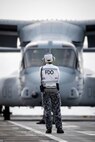 The Fllight Deck Officer watches on as a United States Marines MV-22B Osprey conducts landings on HMAS Canberra during Exercise Talisman Sabre 2019. Talisman Sabre 2019 is a bilateral combined Australian and United States training activity.



TS19 is designed to practice our respective military services and associated agencies in planning and conducting Combined and Joint Task Force operations, and improve the combat readiness and interoperability between Australian and US forces.



TS19 will be the eighth iteration of the exercise and consists of a Field Training Exercise incorporating force preparation (logistic) activities, amphibious landings, land force manoeuvre, urban operations, air operations, maritime operations and Special Forces activities.



(Photo by Richard Cardell)