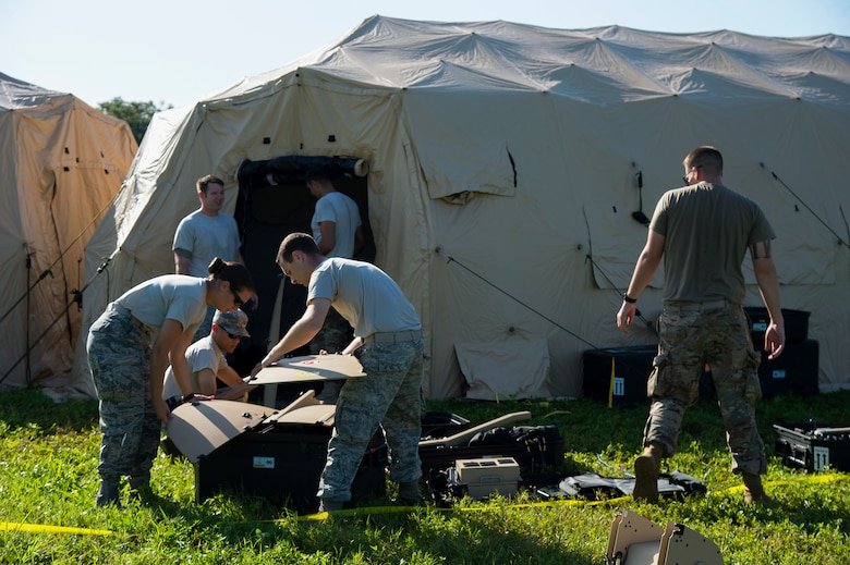 U.S. Air Force Airmen with the 193 Special Operations Communication Squadron, set up a satellite communications system, July 18, 2019, at MacDill Air Force Base, Fla.