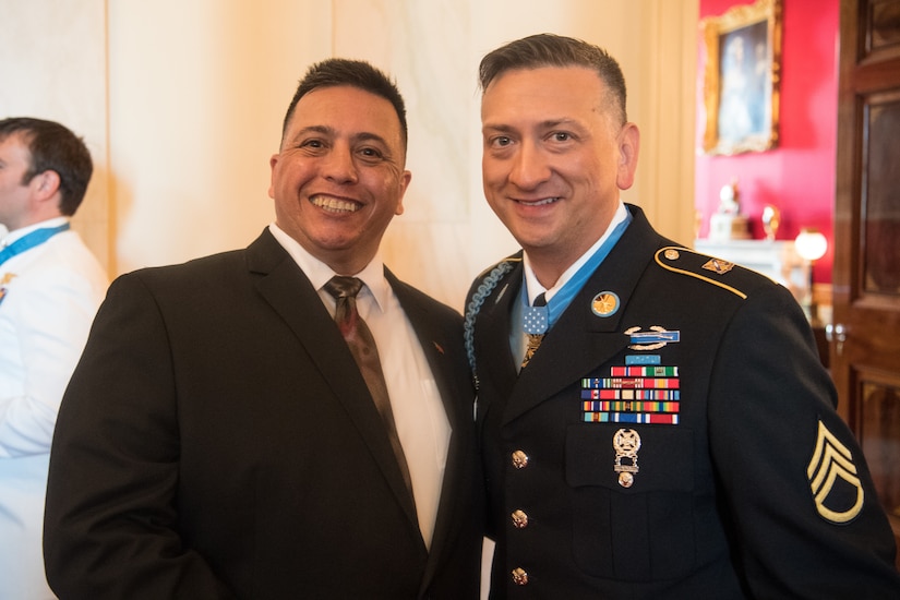 Former U.S. Army Staff Sgt. David G. Bellavia, and his Army Recruiter Retired Sgt. 1st Class Gustavo Reina in Washington, D.C., June 25, 2019. Bellavia was awarded the Medal of Honor June 25, 2019, for actions while serving as a squad leader with the 1st Infantry Division in support of Operation Phantom Fury in Fallujah, Iraq when a squad from his platoon became trapped by intense enemy fire. (U.S. Army Photo by Sgt. Kevin Roy)