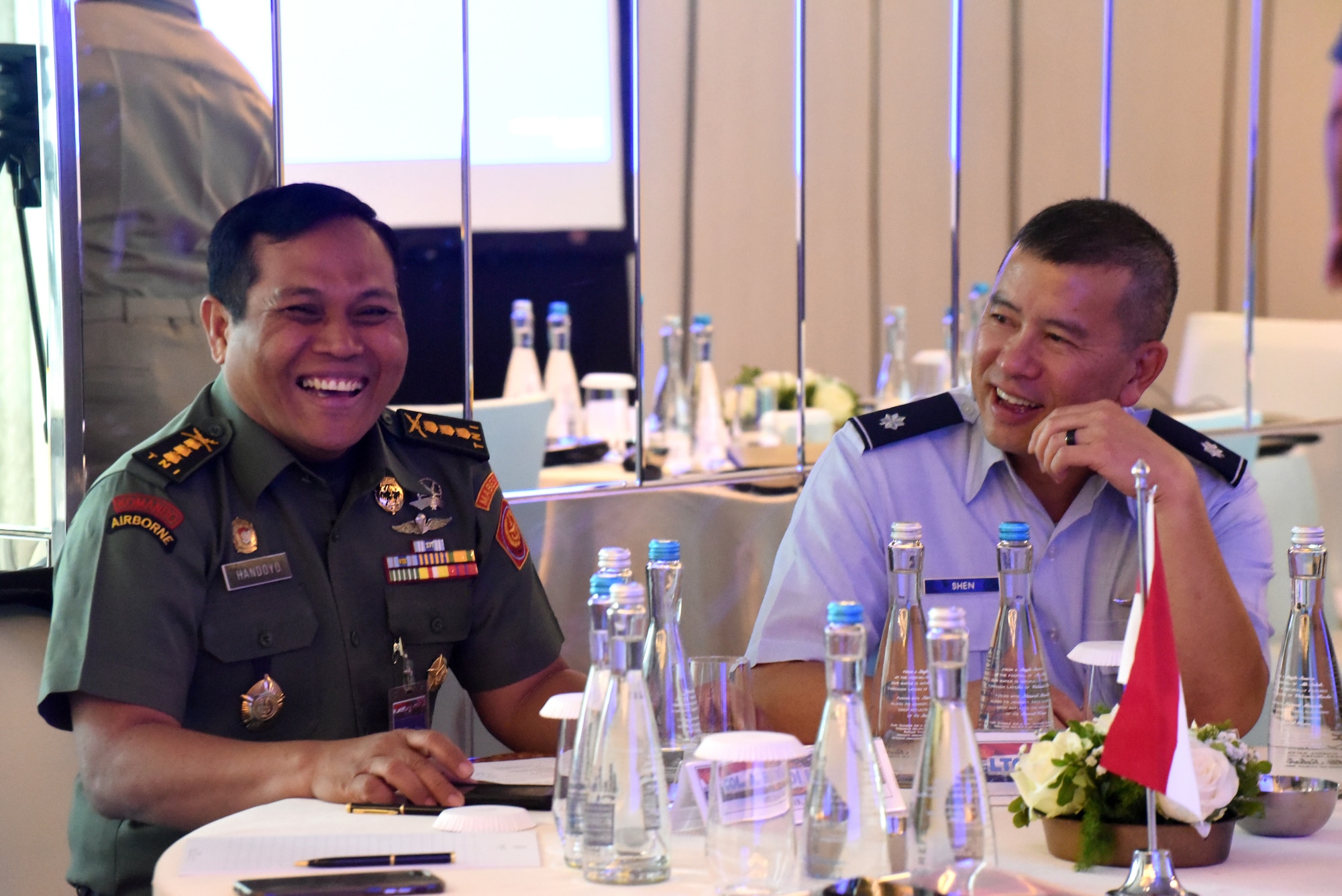 Hawaii Air National Guard Lt. Col. Frances T. Shen, Senior State Partnership Program Cyber Lead, and Tentara Nasional Indonesia Army Col. Achmad Budi Handoyo, Senior Staff Officer for Joint Exercise Operations Staff TNI HQ, have a discussion prior to opening remarks of the 2019 Information System and Technology Exchange, July 22, 2019, Jakarta, Indonesia. This year’s third annual ISTX falls under the Hawaii National Guard’s State Partnership Program, and aims to share best practices, assist in cybersecurity doctrine development, and enhance the cybersecurity capabilities to effectively defend and protect critical cyber information infrastructure from malicious virus and cyber intrusion.
