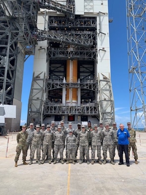 AFROTC cadets stand in front of United Launch Alliance’s Delta IV rocket during Session 2 of the AFROTC space summer immersion program, July 22, 2019, at Space Launch Complex-37 on Cape Canaveral Air Force Station, Fla. The program teaches cadets about AFSPC’s space warfighting capabilities and provides opportunities for leadership development and mentorship.