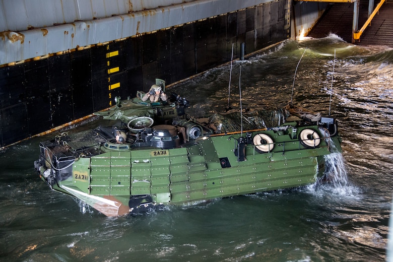 U.S. Marines with Golf Company, Battalion Landing Team, 2nd Battalion, 8th Marine Regiment conduct ship-to-shore movements to Harpers Ferry-class dock landing ship USS Oak Hill (LSD 51) during Amphibious Squadron (PHIBRON) Marines Expeditionary Unit (MEU) Integration Training (PMINT) in vicinity of Camp Lejeune, North Carolina, July 11 2019. PMINT is part of the 26th MEU’s and PHIBRON 8’s pre-deployment training program, which enhances interoperability and familiarizes Marines and Sailors to life on ship prior to deployment. (U.S. Marine Corps photo by Cpl. Nathan Reyes)