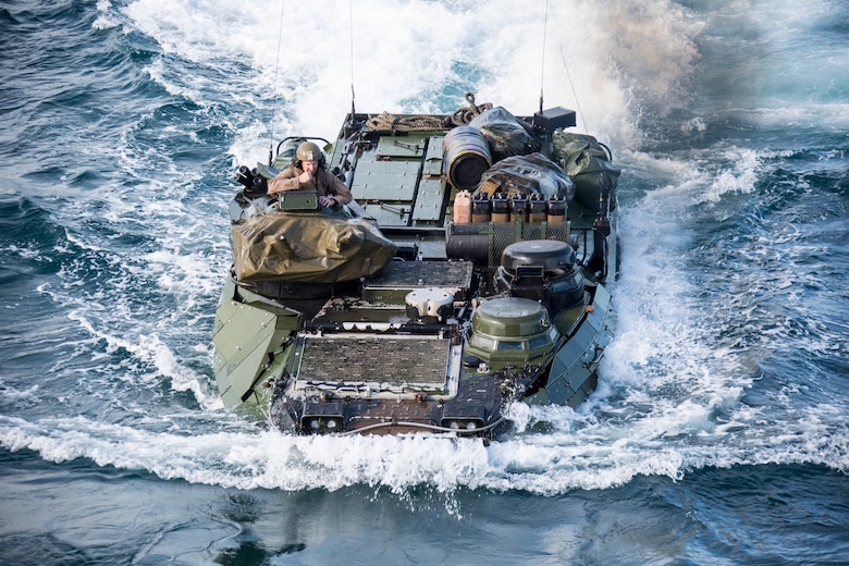 U.S. Marines with Golf Company, Battalion Landing Team, 2nd Battalion, 8th Marine Regiment, 26th Marine Expeditionary Unit (MEU), conduct ship-to-shore movements to Harpers Ferry-class dock landing ship USS Oak Hill (LSD 51) during Amphibious Squadron (PHIBRON) MEU Integration Training (PMINT) in vicinity of Camp Lejeune, North Carolina, July 11 2019. PMINT is part of the 26th MEU’s and PHIBRON 8’s pre-deployment training program, which enhances interoperability and familiarizes Marines and Sailors to life on ship prior to deployment. (U.S. Marine Corps photo by Cpl. Nathan Reyes)