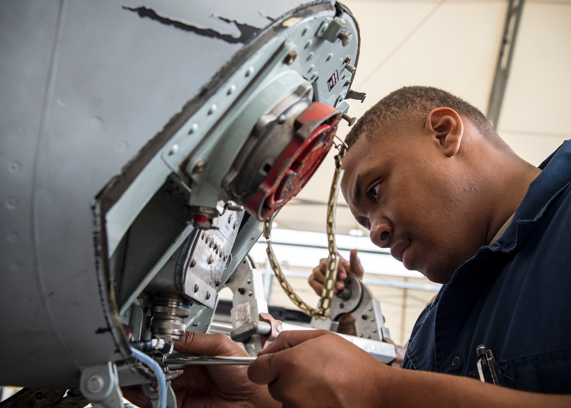 Senior Airman Jordan Lawson, 75th Aircraft Maintenance Unit crew chief, performs maintenance on an A-10C Thunderbolt II during a sortie surge exercise, July 24, 2019, at Moody Air Force Base, Ga. The exercise was conducted to determine Airmen's abilities to perform effectively while generating combat or training sorties at an accelerated rate. Throughout the four-day surge, pilots and maintainers completed 131 sorties spanning approximately 152 flying hours. (U.S. Air Force photo by Airman 1st Class Eugene Oliver)