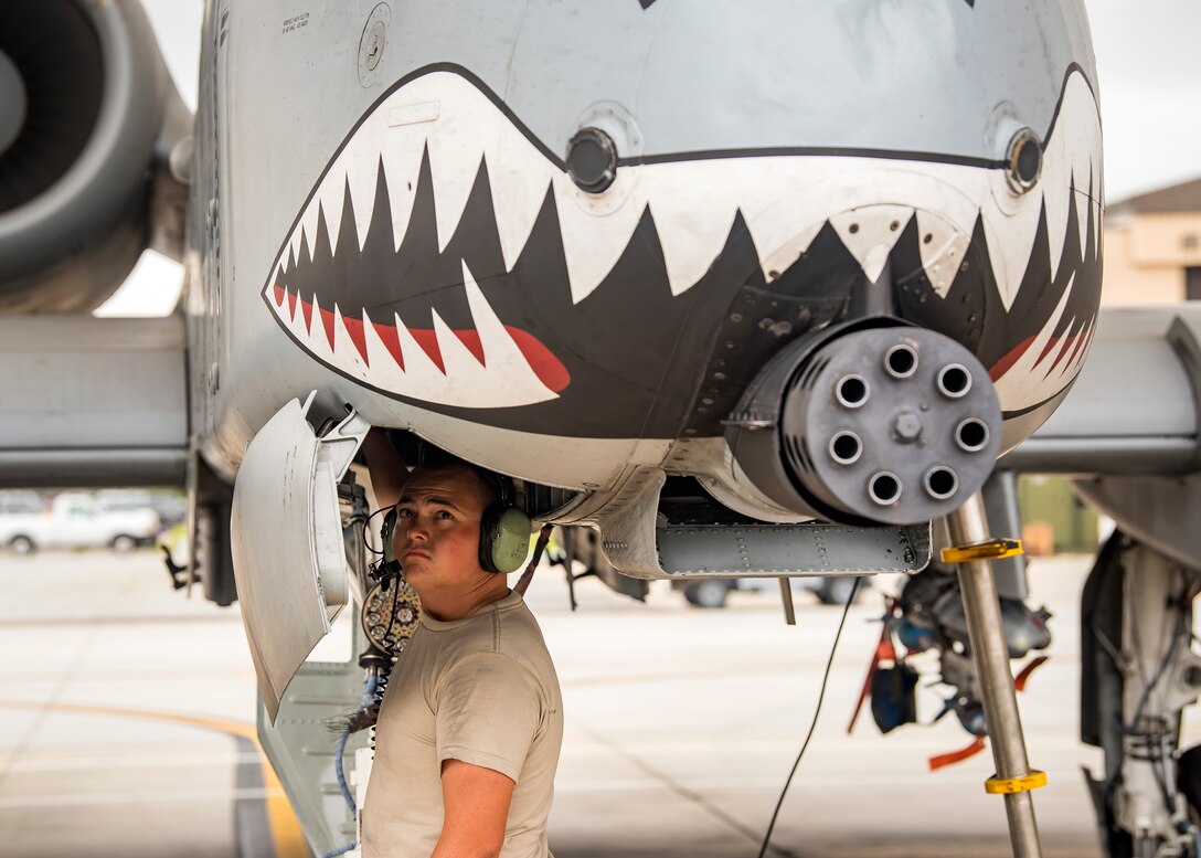 Senior Airman Mitch Yuncker, 75th Aircraft Maintenance Unit assistant dedicated crew chief, inspects the panel of an A-10C Thunderbolt II during a sortie surge exercise, July 24, 2019, at Moody Air Force Base, Ga. The exercise was conducted to determine Airmen's abilities to perform effectively while generating combat or training sorties at an accelerated rate. Throughout the four-day surge, pilots and maintainers completed 131 sorties spanning approximately 152 flying hours. (U.S. Air Force photo by Airman 1st Class Eugene Oliver)