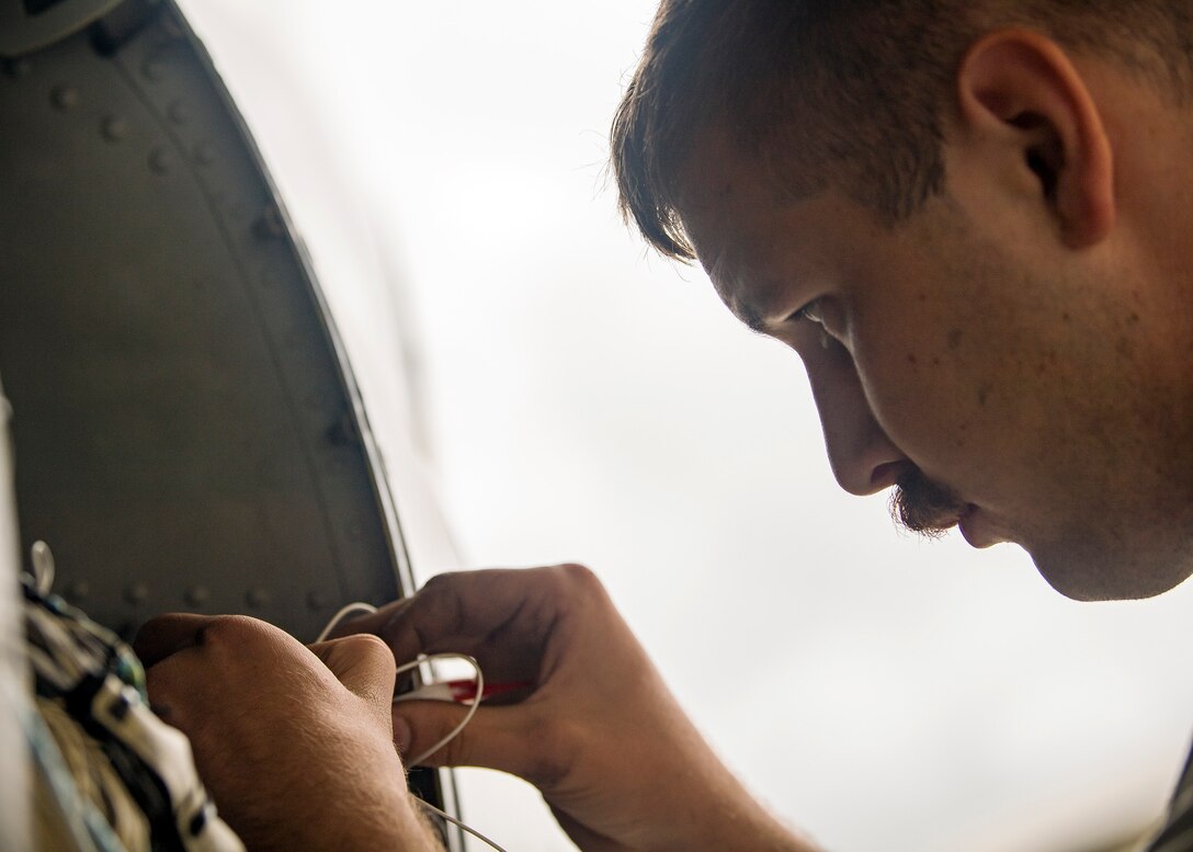 Senior Airman Andrew Bobick, 75th Aircraft Maintenance Unit avionics journeyman, performs maintenance on an A-10C Thunderbolt II during a sortie surge exercise, July 24, 2019, at Moody Air Force Base, Ga. The exercise was conducted to determine Airmen's abilities to perform effectively while generating combat or training sorties at an accelerated rate. Throughout the four-day surge, pilots and maintainers completed 131 sorties spanning approximately 152 flying hours. (U.S. Air Force photo by Airman 1st Class Eugene Oliver)