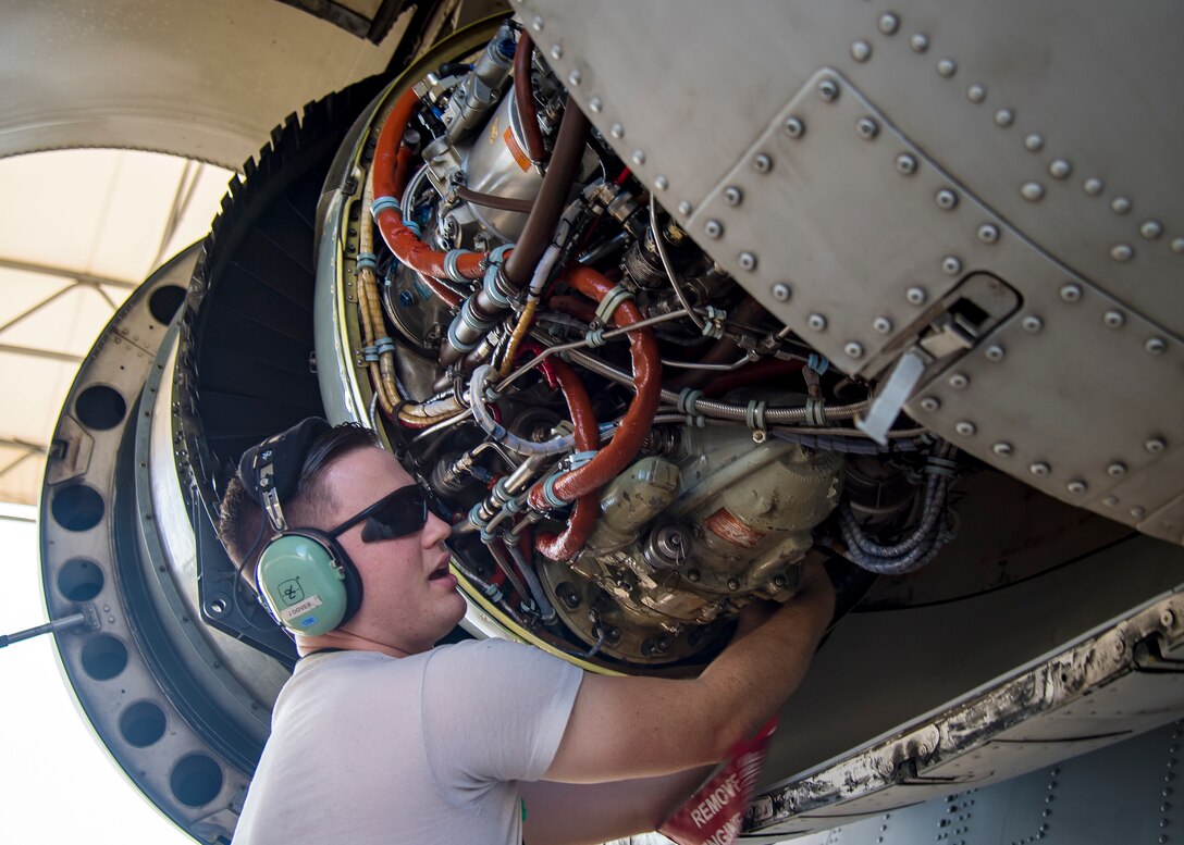 An Airman from the 75th Aircraft Maintenance Unit, performs maintenance on an A-10C Thunderbolt II TF34 engine, during a sortie surge exercise, July 24, 2019, at Moody Air Force Base, Ga. The exercise was conducted to determine Airmen's abilities to perform effectively while generating combat or training sorties at an accelerated rate. Throughout the four-day surge, pilots and maintainers completed 131 sorties spanning approximately 152 flying hours. (U.S. Air Force photo by Airman 1st Class Eugene Oliver)