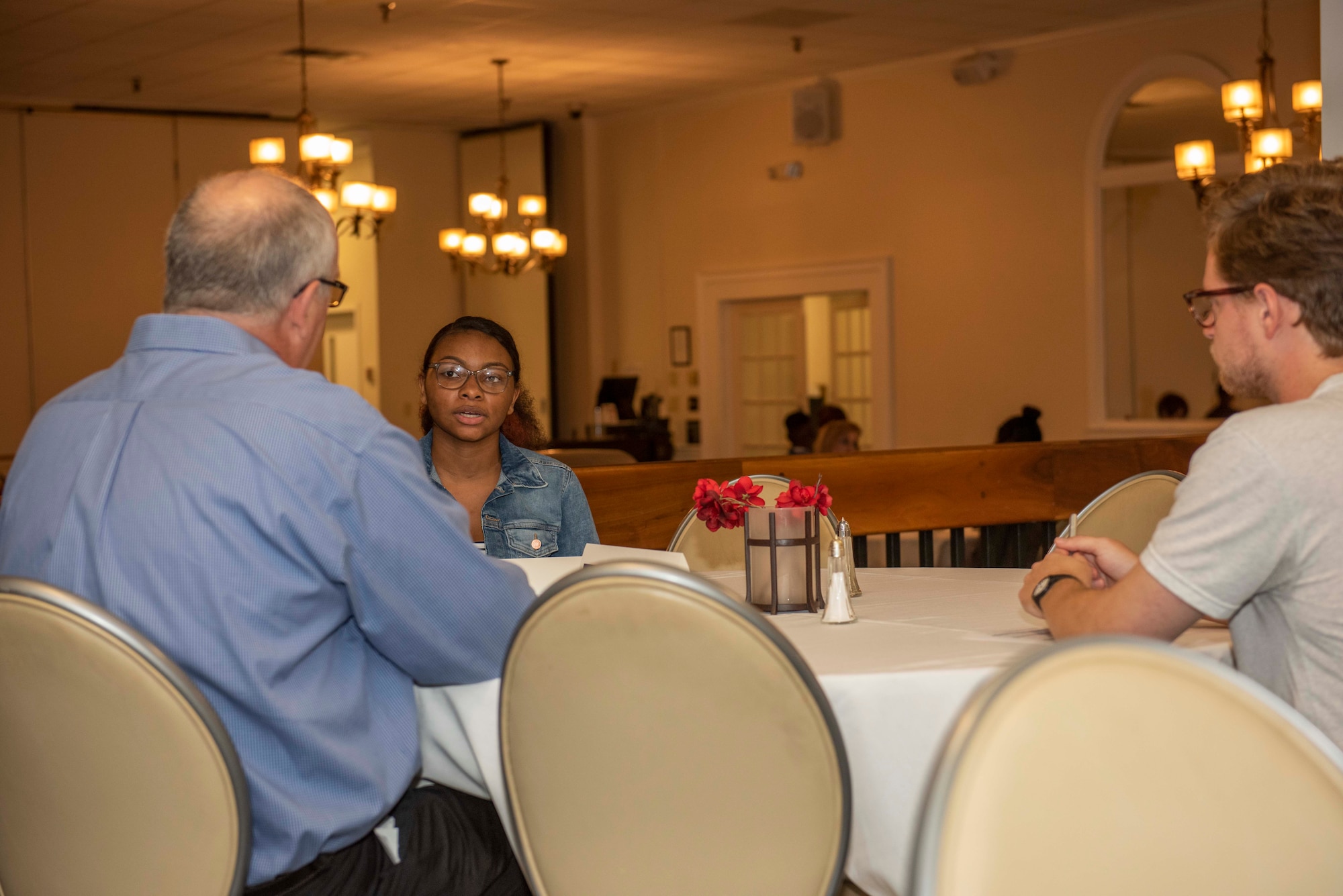 Members of the 20th Support Squadron (FSS) perform a mock interview with a high school student at Shaw Air Force Base, South Carolina, July 24, 2019.