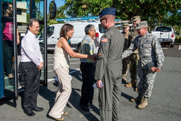 U.S. Air Force leadership greet Hawaii State Legislative representatives in front of the Pacific Air Forces Headquarters July, 24, 2019. Eleven Hawaii legislatures visited with U.S. Air Force representatives in an effort to broaden understandings of Air Force missions, capabilities, roles and responsibilities. (U.S. Air Force photo by Staff Sgt. Jack Sanders)