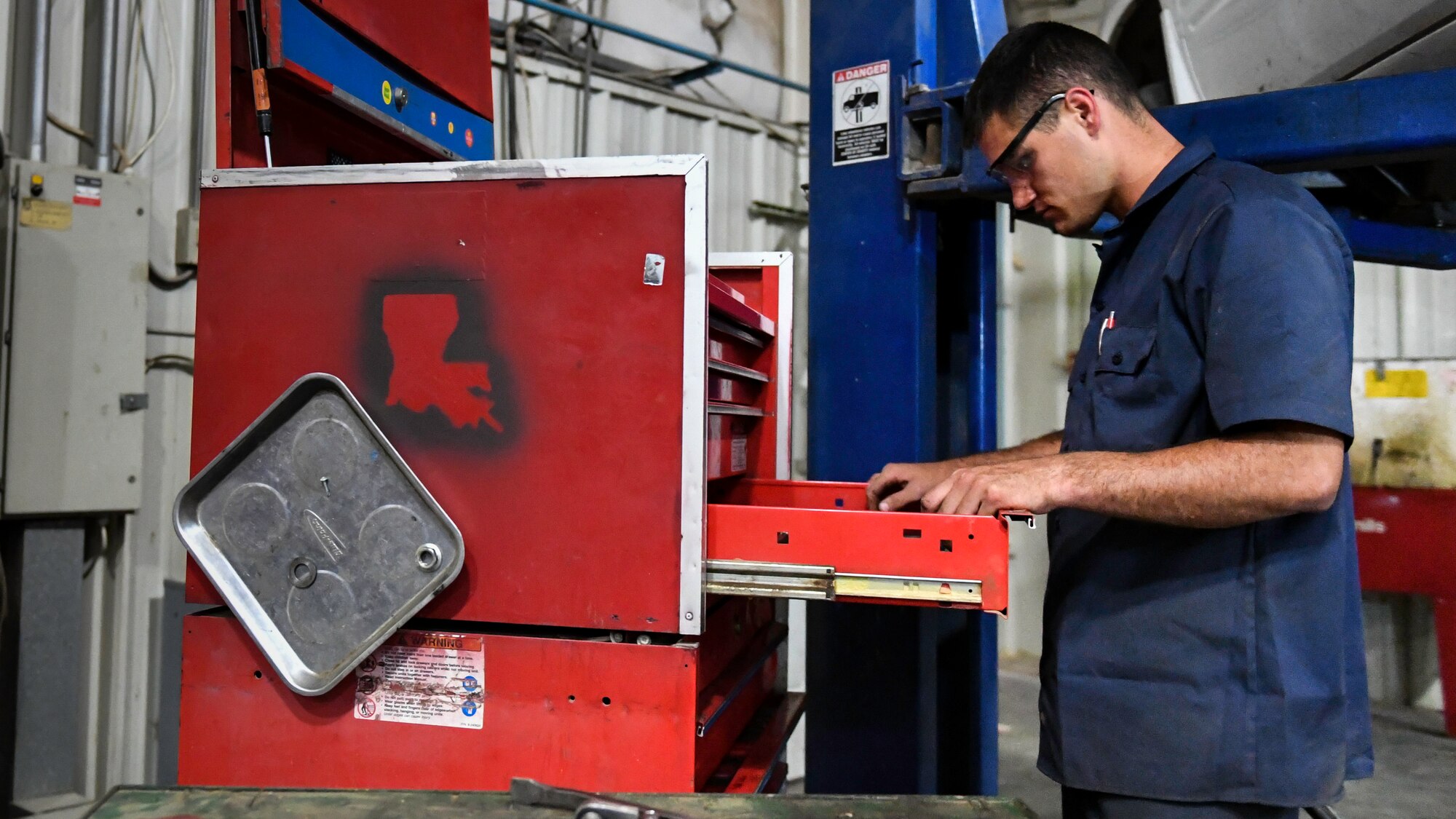 U.S. Air Force Senior Airman Darian O’Banion, 386th Expeditionary Logistics Readiness Squadron vehicle and equipment maintenance journeyman, searches for a tool in a toolbox at Ali Al Salem Air Base, Kuwait, July 29, 2019. Toolboxes each containing over 350 items necessary for the maintenance of vehicles and equipment on base, are assigned to individual Airmen. (U.S. Air Force photo by Staff Sgt. Mozer O. Da Cunha)