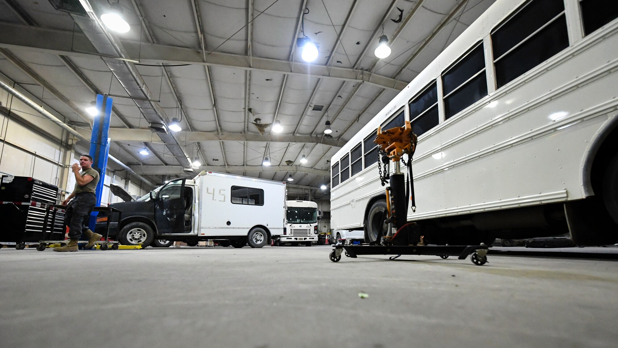 Vehicles wait for repairs at the vehicle and equipment maintenance shop on Ali Al Salem Air Base, Kuwait, July 29, 2019. Airmen assigned to the vehicle and equipment maintenance shop work on an average of 10 different automobiles a week. (U.S. Air Force photo by Staff Sgt. Mozer O. Da Cunha)