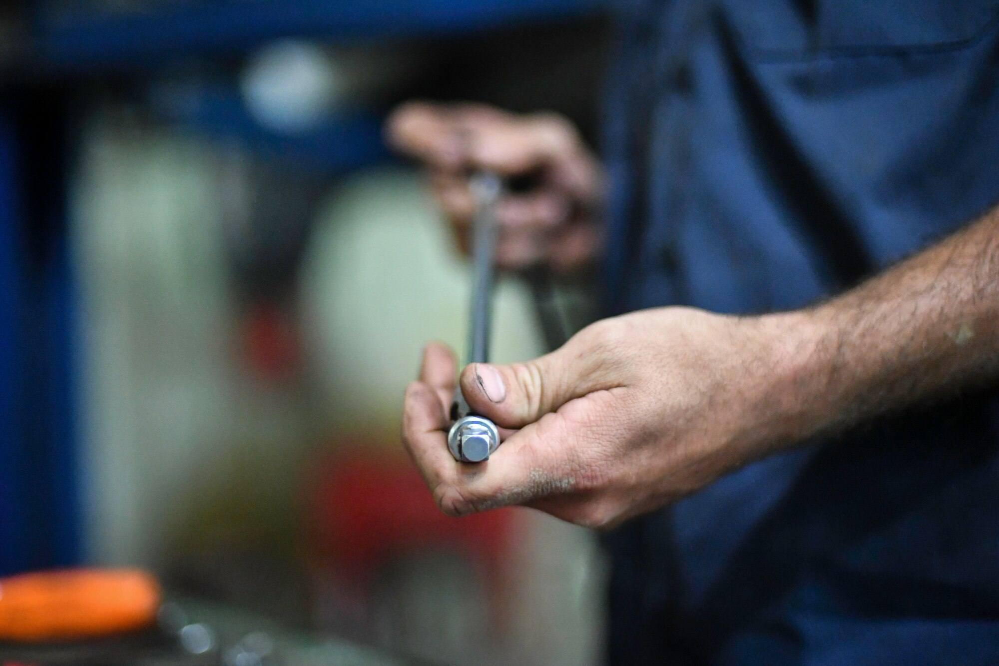 U.S. Air Force Senior Airman Darian O’Banion, 386th Expeditionary Logistics Readiness Squadron vehicle and equipment maintenance journeyman, poses for a photo at Ali Al Salem Air Base, Kuwait, July 29, 2019. Airmen assigned to the vehicle and equipment maintenance shop work on an average of 10 different automobiles a week. (U.S. Air Force photo by Staff Sgt. Mozer O. Da Cunha)