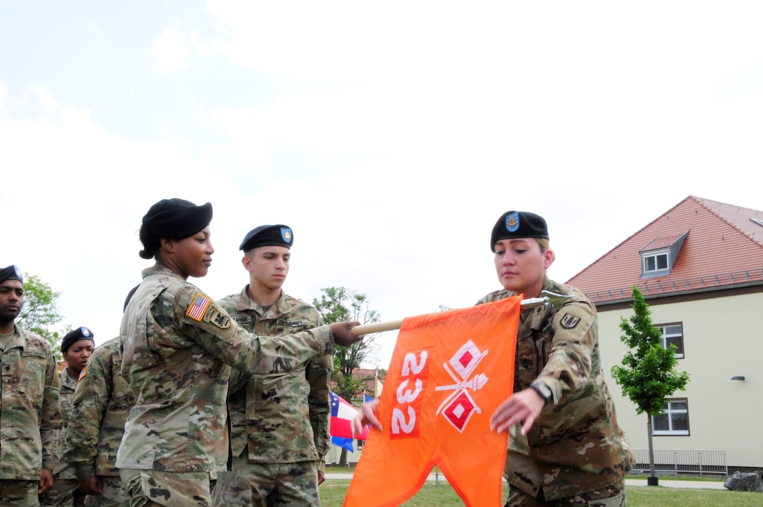 232nd Signal Company's guidon is unrolled, signifying the company's official activation