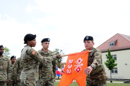 232nd Signal Company's guidon is unrolled, signifying the company's official activation