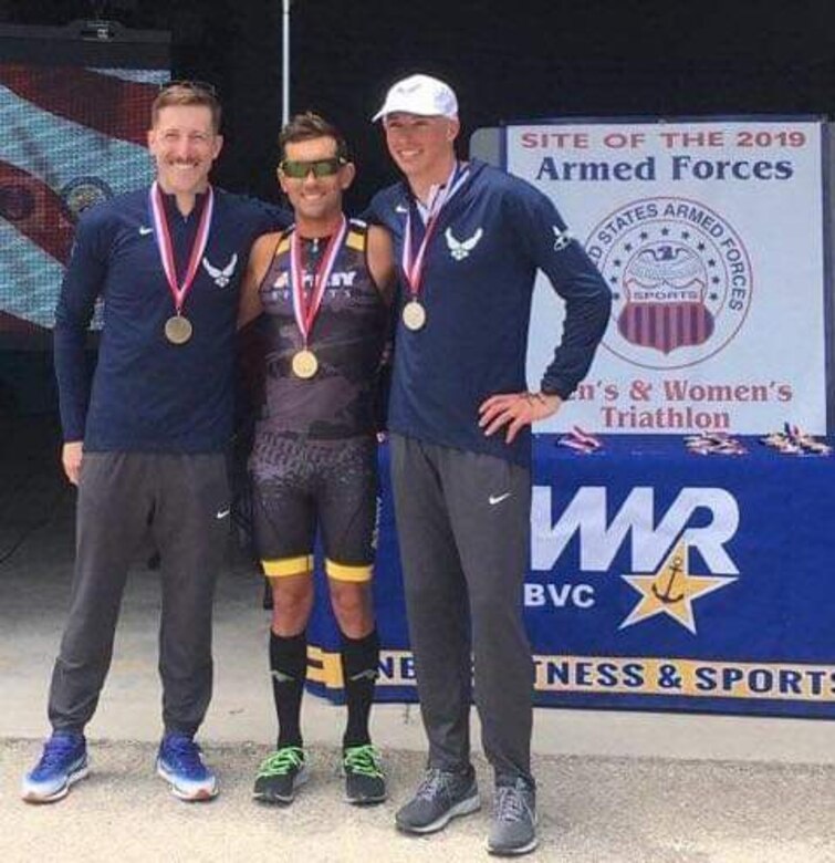 POINT MUGU, Calif. -- Capt.  John “Max” Bierman, left, 12th Space Warning Squadron crew commander, placed third in the Armed Forces Triathlon Championships in Point Mugu, California, June 22, 2019. This win qualifies him to represent the U.S. Armed Forces in the World Military Games in Wuhan, China in October. (U.S. Air Force Courtesy photo)