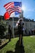 Color Guard Soldiers assigned to the 7th Mission Support Command stand in front of the Four Braves Memorial in Periers, France during the 75th Anniversary of the liberation of the town on July 27, 2019. The 90th Infantry Division, now the 90th Sustainment Brigade, liberated the town during World War II seven weeks after landing on Utah beach just 35 kilometers away. (U.S. Army Reserve Photo by Capt. Joe Bush)