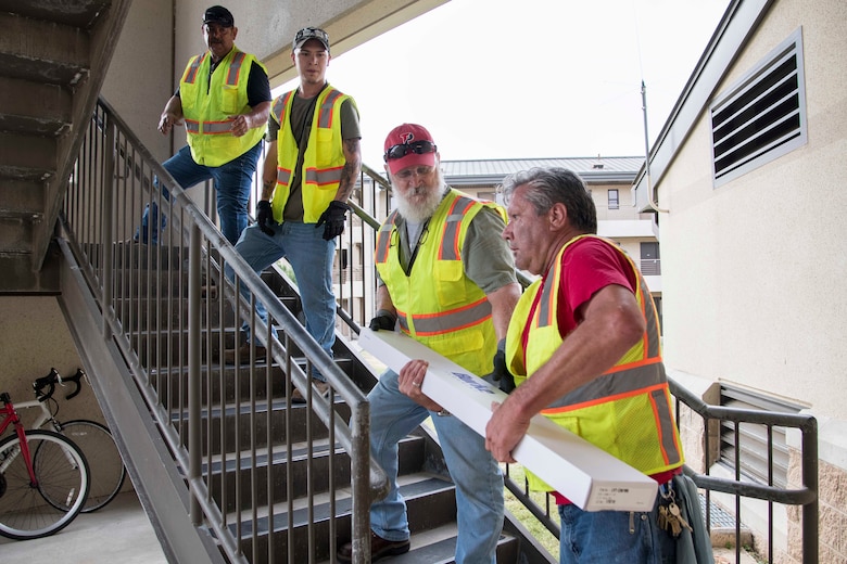Professionals from the 502nd Air Base Wing Civil Engineer Group work to remediate dorms with mold on Monday, July 29, 2019 and Joint Base San Antonio–Lackland. The mold remediation is taking place after Airmen at JBSA-Lackland voiced their concerns. (U.S. Air Force photo by Sean Worrell)