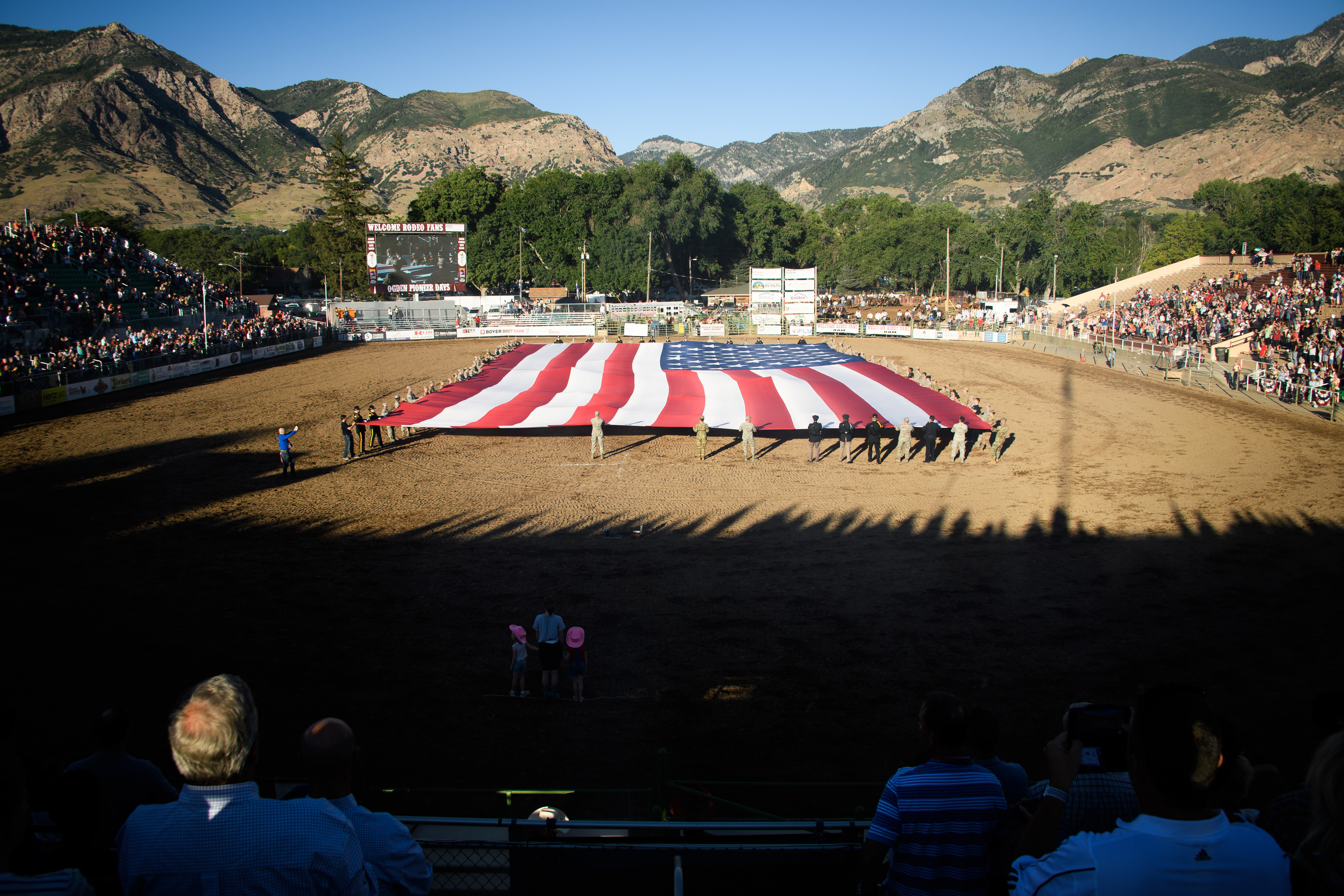 Hill Airmen Unfurl Flag At Ogden Pioneer Days Rodeo