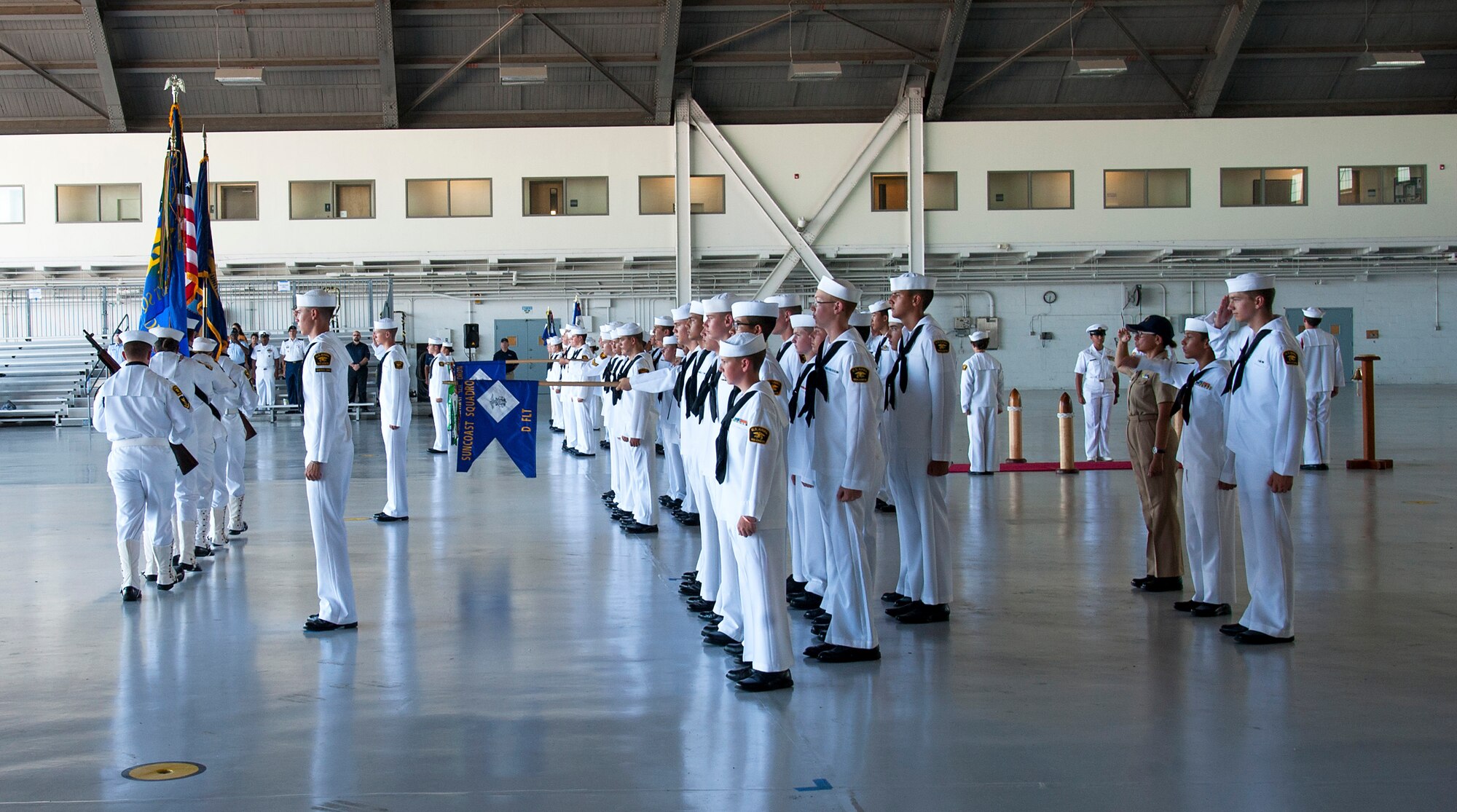 U.S. Naval Sea Cadet Corps (USNSCC) recruit training flight 1902 conducts a graduation ceremony, July 20, 2019, at MacDill Air Force Base, Fla. The USNSCC is a national youth leadership development organization that promotes interest in naval disciplines and is modeled after the Navy’s professional development system. (U.S. Air Force photo by Airman 1st Class Shannon Bowman)