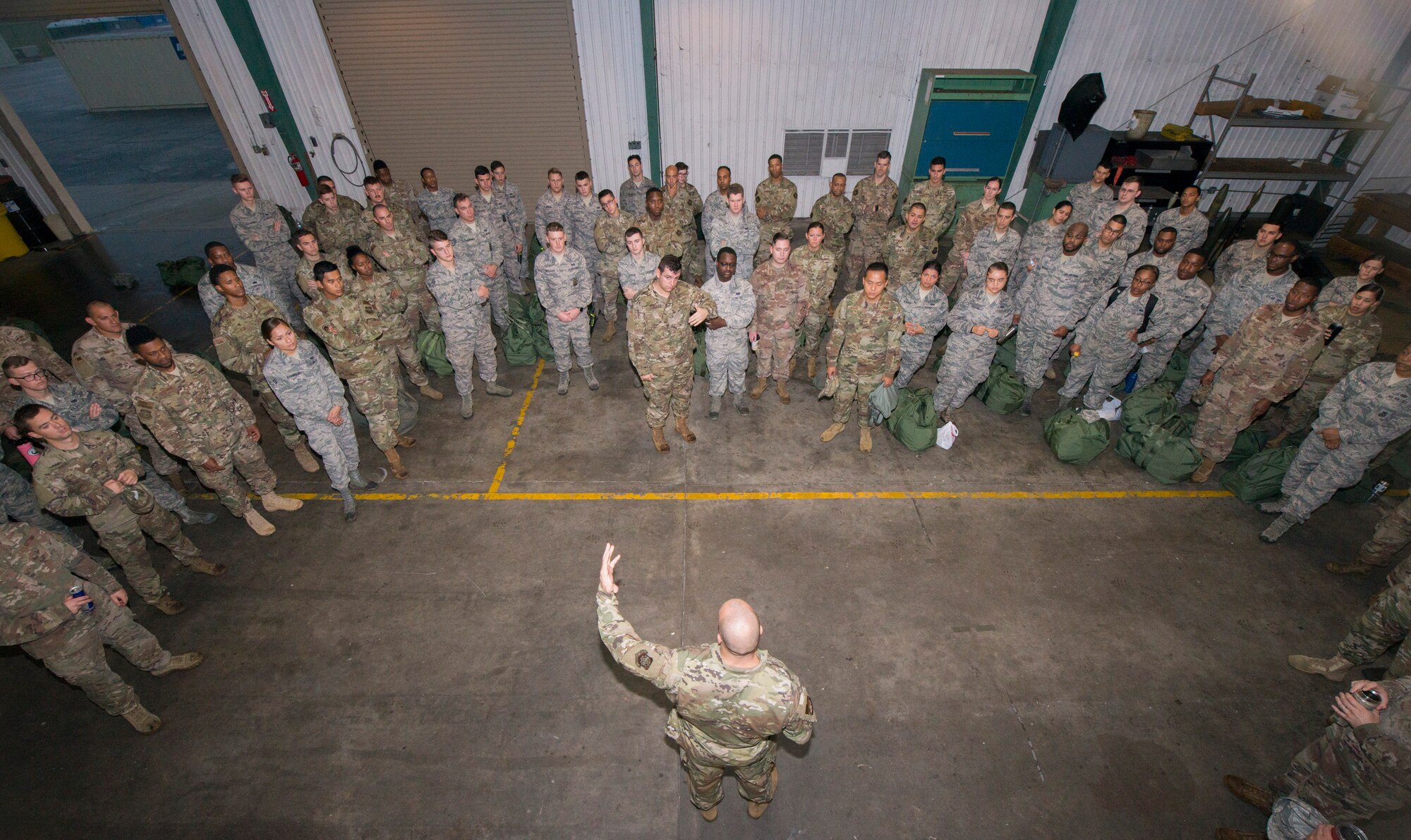 Senior Master Sgt. Joshua Malymezian, the 6th Contracting Squadron superintendent, briefs 6th Mission Support Group Airmen about what to expect during deployment readiness training at MacDill Air Force Base, Fla., July 25, 2019.