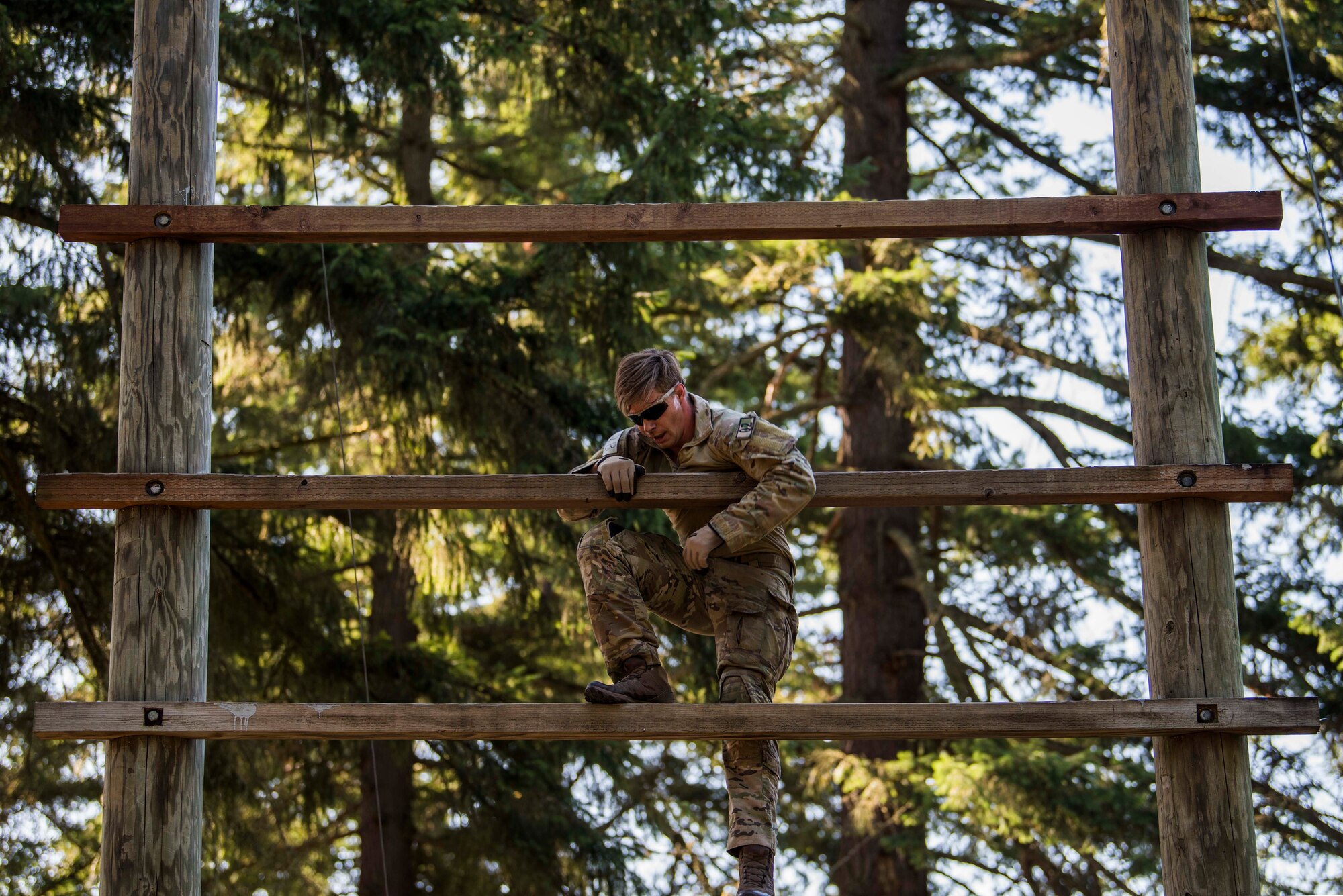 A U.S. Air Force Tactical Air Control Party (TACP) Airman assigned to the 3rd Air Support Operations Squadron, Fort Wainwright, Alaska, descends an obstacle during the 2019 Lightning Challenge at Joint Base Lewis-McChord, Wash., July 29, 2019.