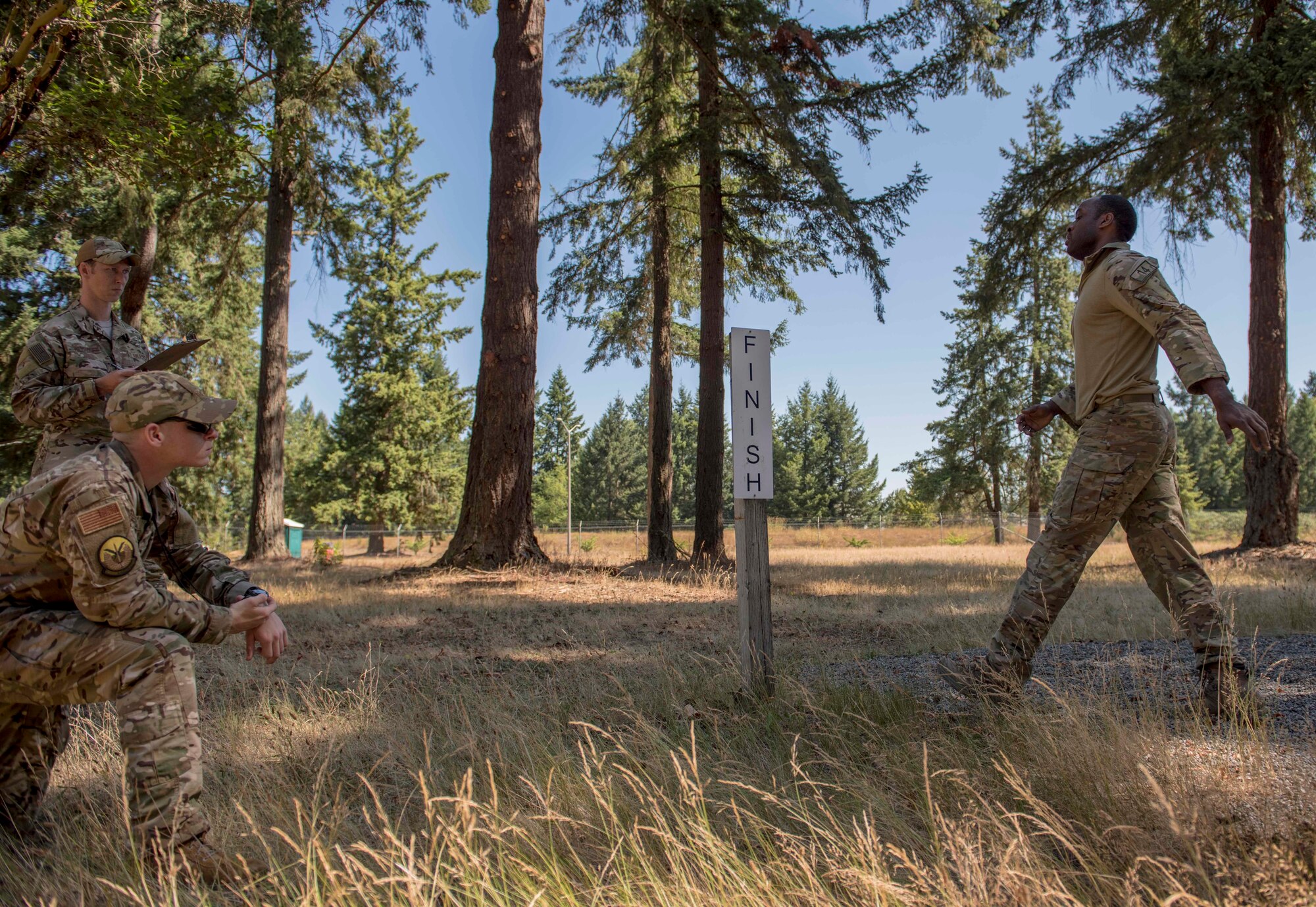 A U.S. Air Force Tactical Air Control Party (TACP) Airman assigned to the 5th Air Support Operations Squadron, Joint Base Lewis-McChord (JBLM), Wash., finishes the obstacle course section of the 2019 Lightning Challenge at JBLM, Wash., July 29, 2019.