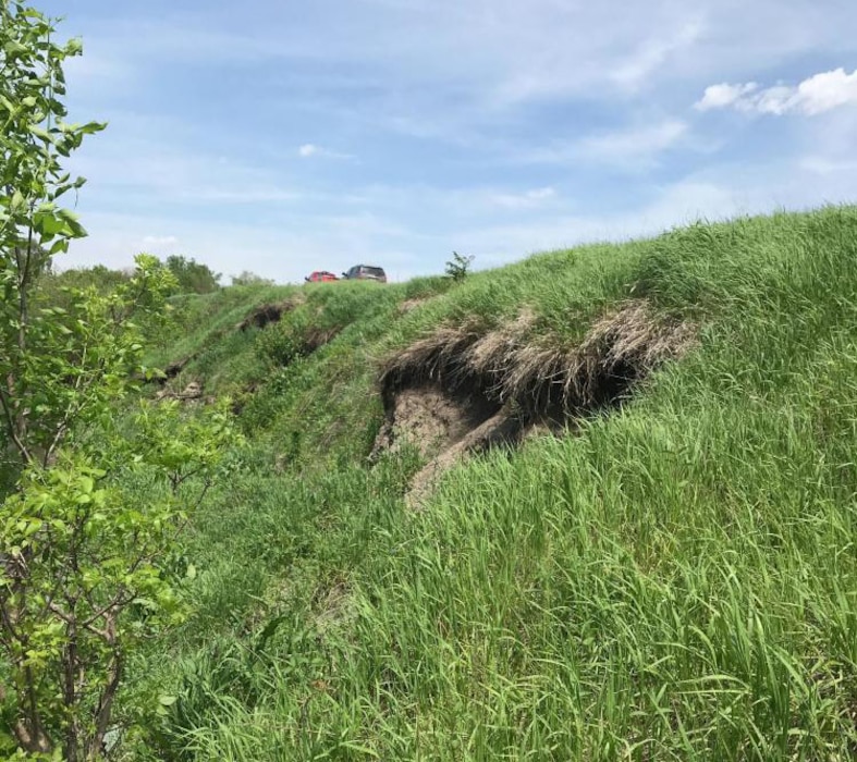 Salt Creek channel bank erosion into the levee embankment identified during an initial damage assessment May 17, 2019.