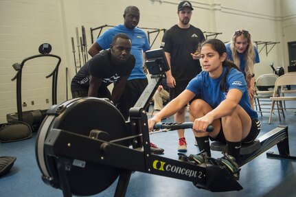 U.S. Air Force 1st Lt. Tiffany Hatcher, United States Special Operations Command Detachment-1, Special Operations Forces AC-130 branch chief, Eglin Air Force Base, Fla., performs exercises on a rowing machine during the Alpha Warrior Super Regional event July 27, 2019, at Joint Base Charleston, S.C. Twelve Airmen competed, tackling a variety of functional fitness obstacles, while utilizing the Joint Base Charleston Fitness Center’s Alpha Warrior battle rig. The competition focuses on a competitor’s overall readiness and is designed to promote more fit and resilient service members.