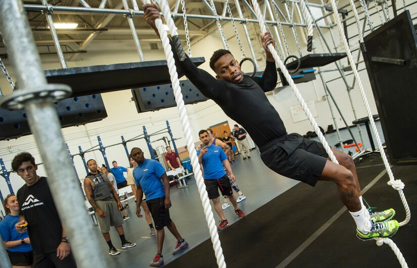 U.S. Air Force Staff Sgt. Robert Carter, 628th Force Support Squadron sports manager, traverses an obstacle during the Alpha Warrior Super Regional event July 27, 2019, at Joint Base Charleston, S.C. Twelve Airmen competed, tackling a variety of functional fitness obstacles, while utilizing the Joint Base Charleston Fitness Center’s Alpha Warrior battle rig. The competition focuses on a competitor’s overall readiness and is designed to promote more fit and resilient service members.