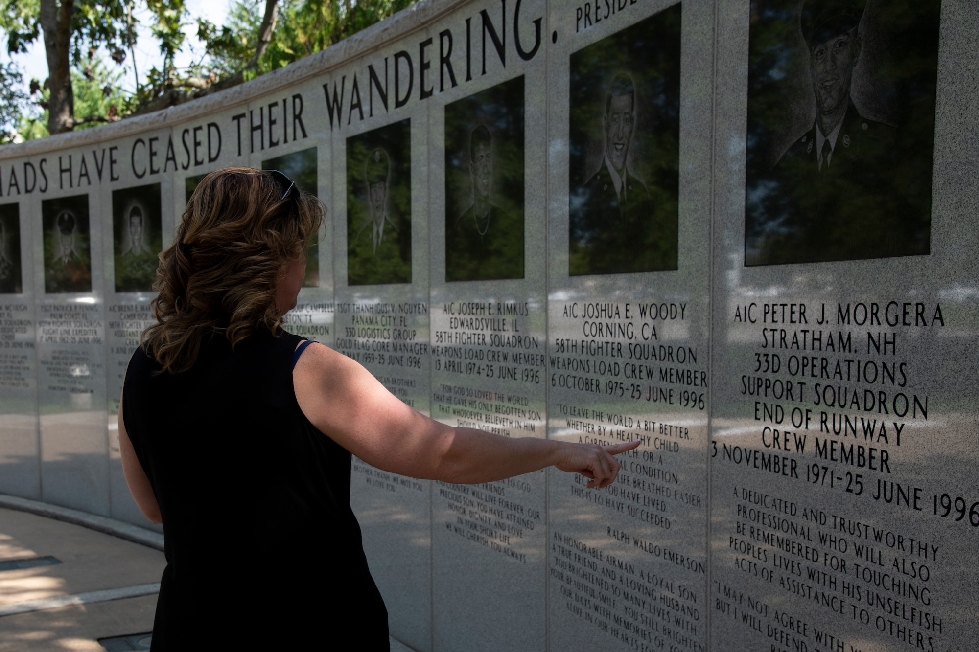 Sally Adams, sister of deceased Senior Airman Earl Cartrette Jr., tours the Khobar Towers memorial at Eglin Air Force Base, Florida, on July 29, 2019. Adams was adopted when she was two weeks old and spent her life searching for her biological family. Upon finding out her brother had died in the 1996 Khobar Towers attack she and her family made the visit to Eglin to see the memorial. (U.S. Air Force photo by Senior Airman Cassidy Woody)