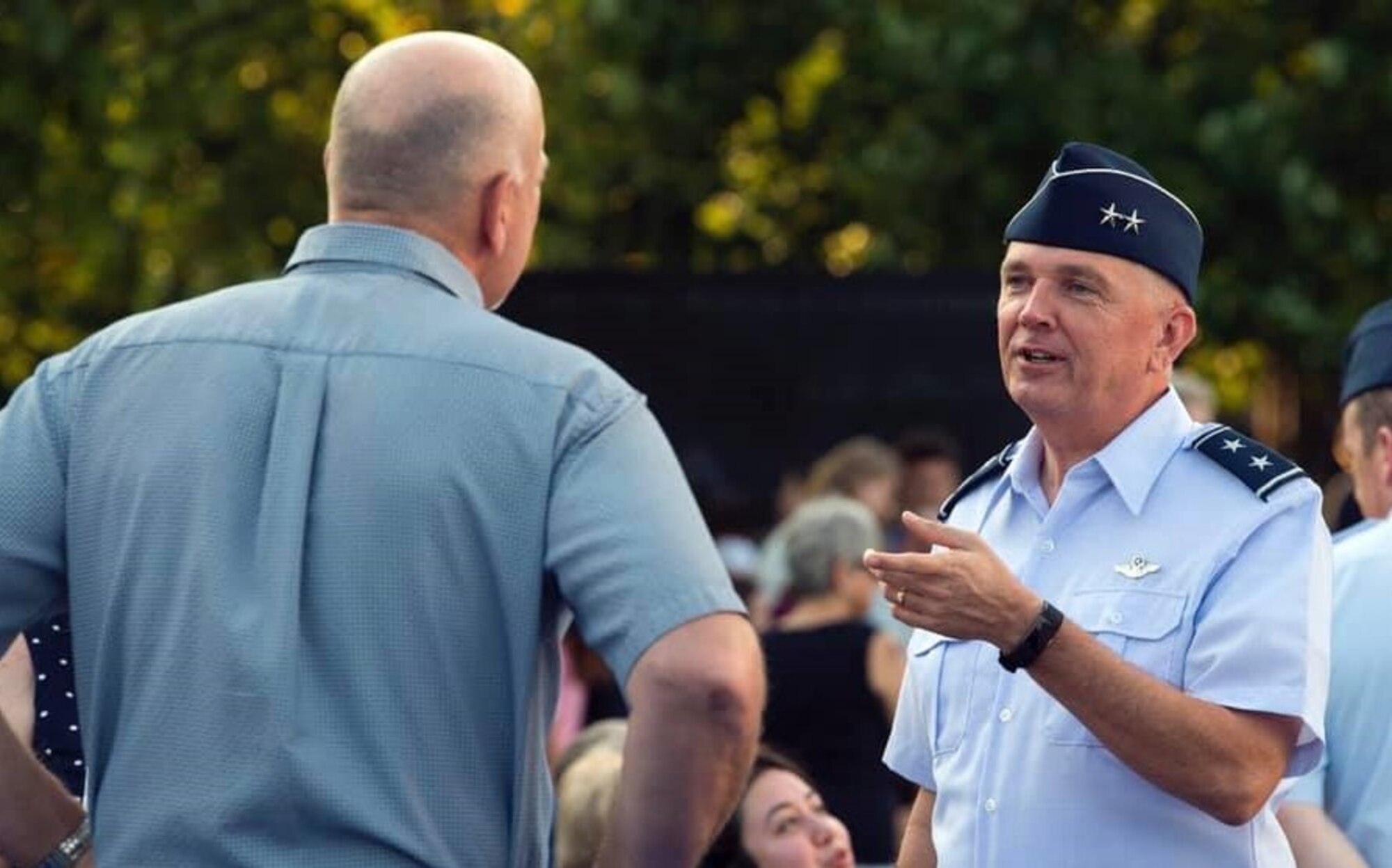 Air Force District of Washington Commander Maj. Gen. Ricky N. Rupp chats with an attendee during the Heritage to Horizons concert at the Air Force Memorial July 26. Presented by the U.S. Air Force Band, the concert features impeccable demonstrations by the Air Force Honor Guard Drill Team as well as world-class music, featuring musicians from the Airmen of Note, Max Impact, Strolling Strings, Singing Sergeants, and the Ceremonial Brass Drum Line.