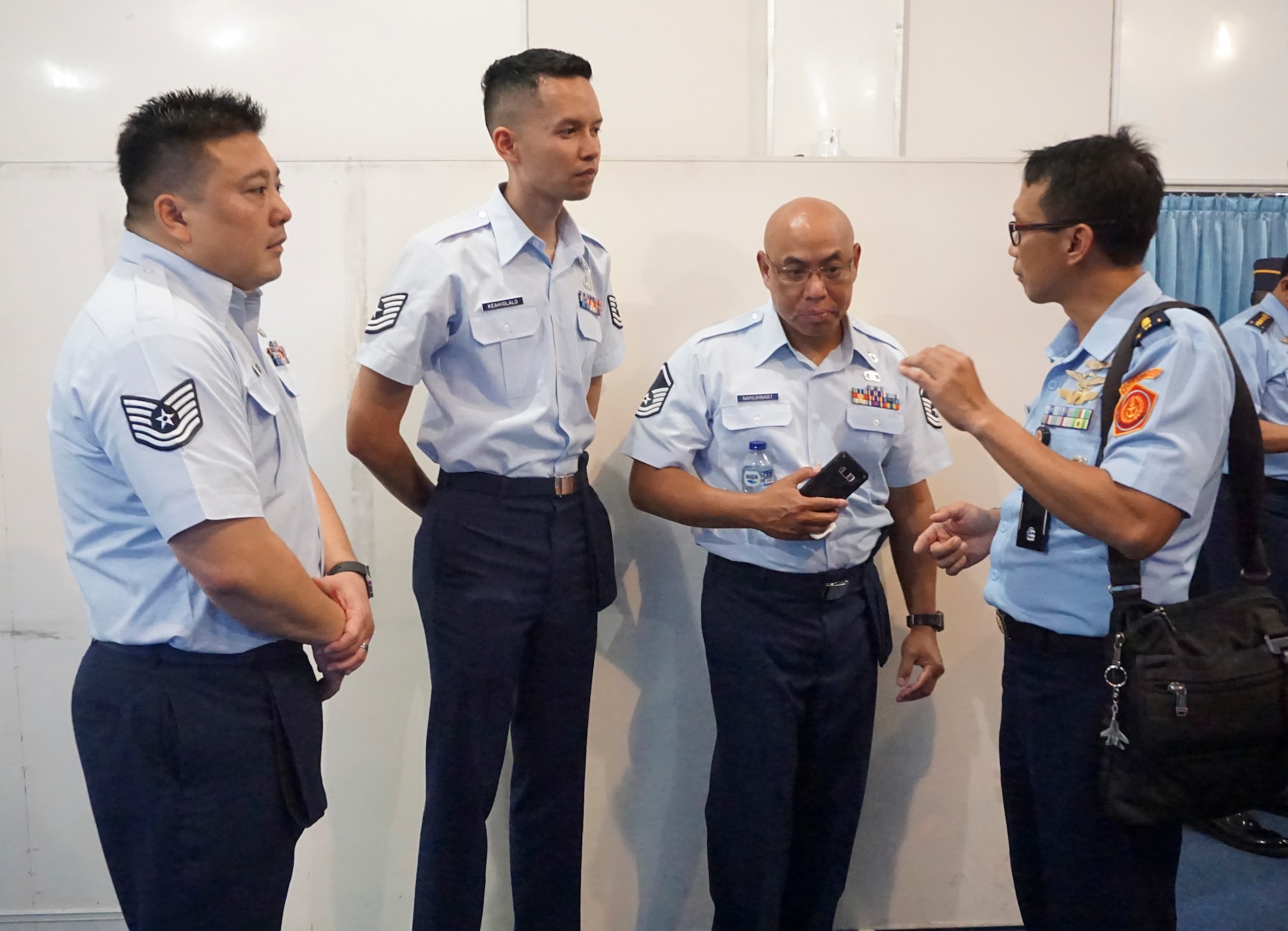Hawaii Air National Guard (HIANG) members from the 169th Air Defense Squadron (ADS) talk with a member of the Indonesian Air Force (TNI) Jul. 10, 2019 in Yogyakarta, Indonesia.