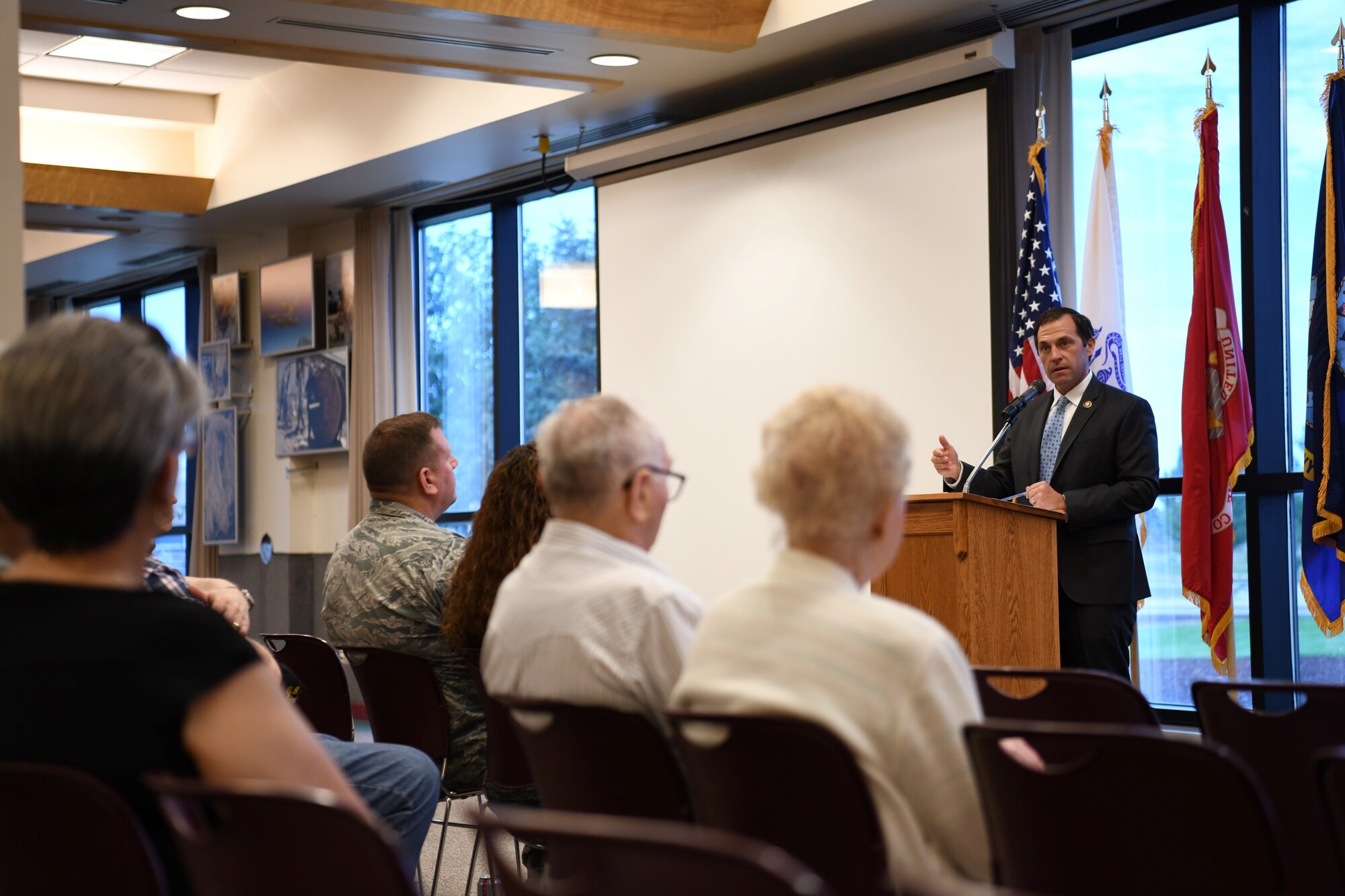 Congressman Jason Crow, 6th District of Colorado Representative, speaks with retirees, July 27, 2019, on Buckley Air Force Base, Colo. Crow emphasized democracy is not inevitable and must be fought for by every generation and that we owe a debt to those who have served. (U.S. Air Force photo by Airman 1st Class Michael D. Mathews)